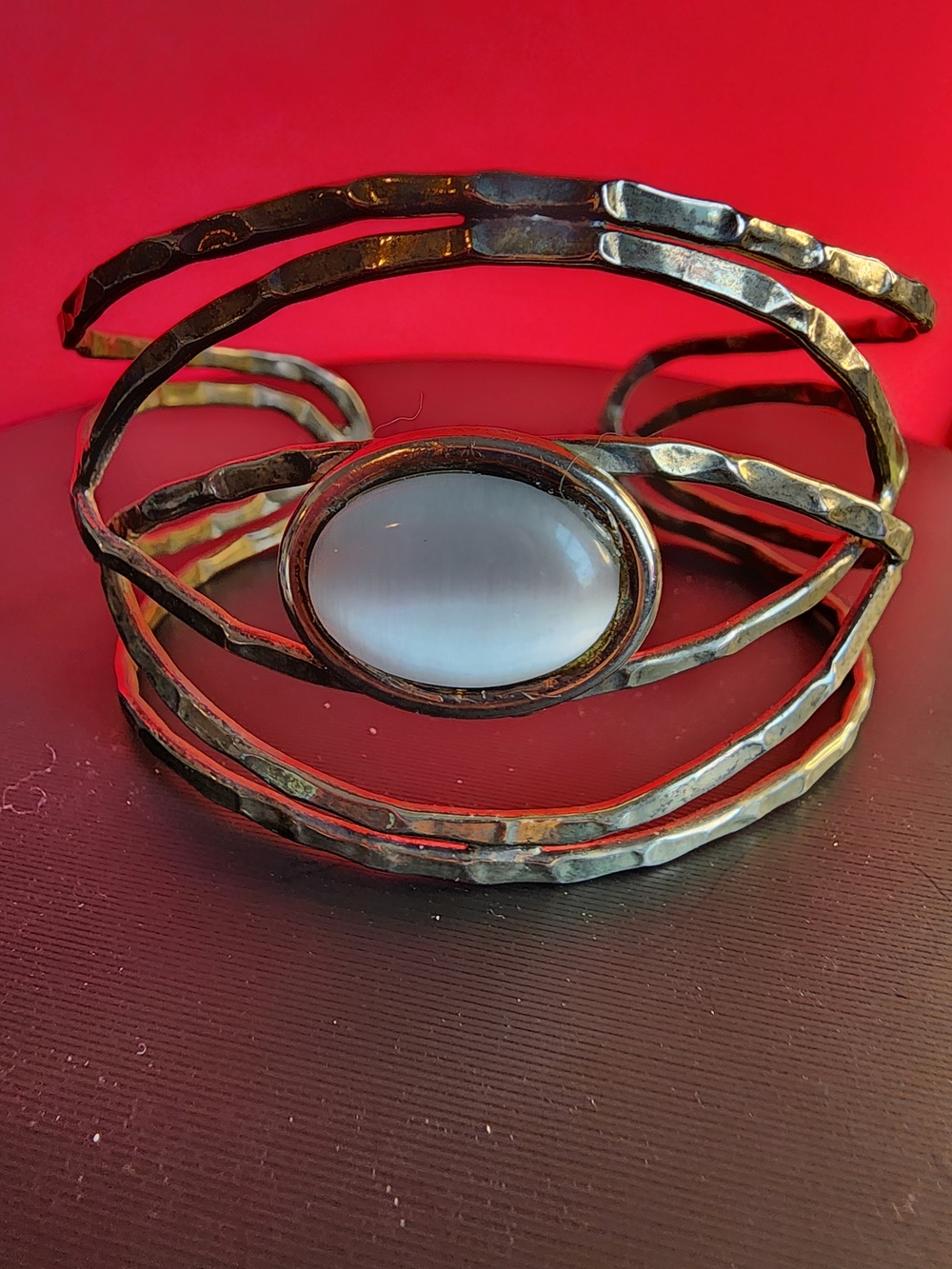 Handcrafted Gold-Tone Cuff Bracelet with White Cabochon